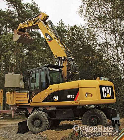 Caterpillar M318D с двухзвенной стрелой